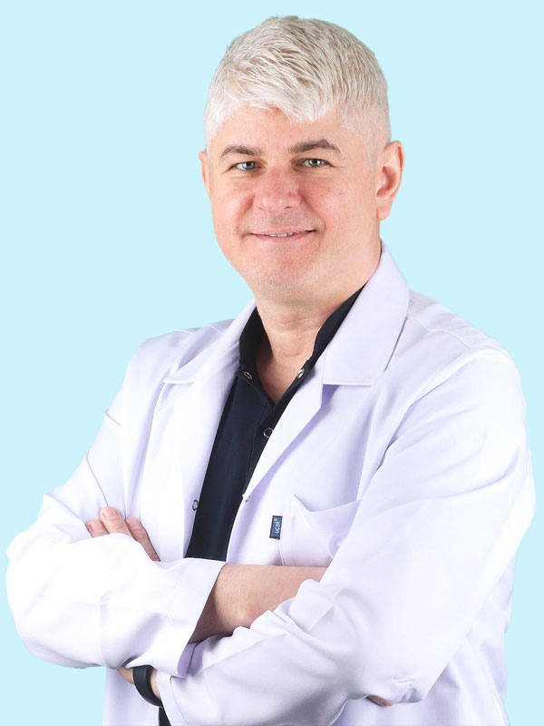DR. DT. BENAN OĞUZ ORTODONTİ UZMANI